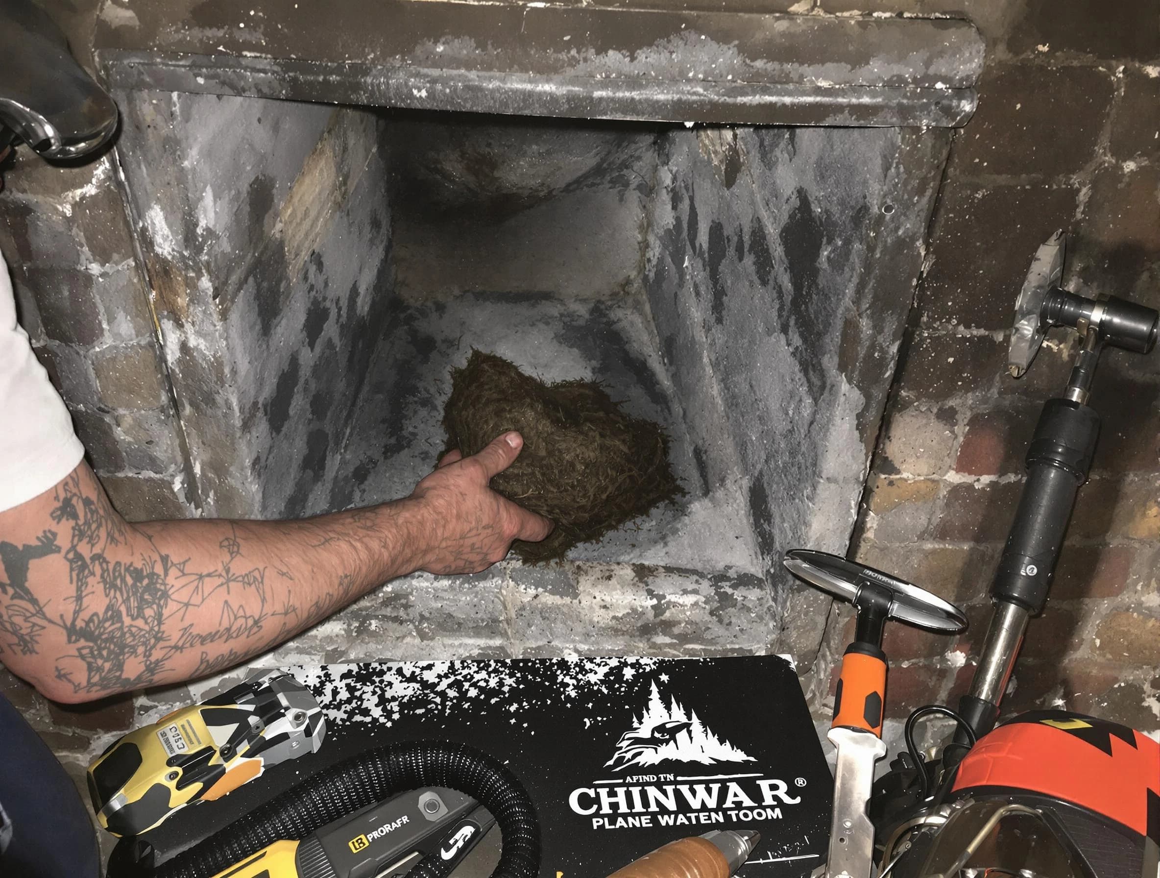 West Haven Chimney Sweep safely removing debris and screening chimney in West Haven, UT